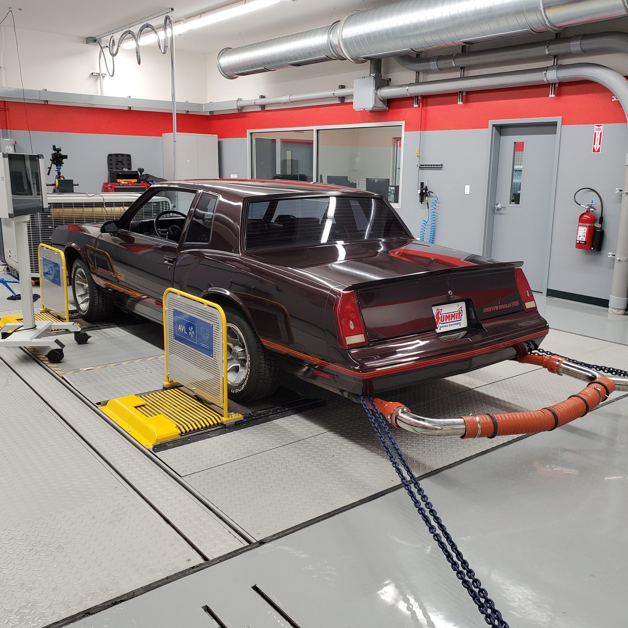 Summit Monte Carlo running emissions testing at the SEMA Garage